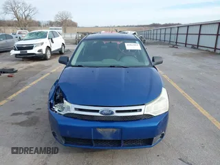 2009 Ford Focus SE with VIN 1FAHP35N39W176884, listed as a IAAI auction lot 41865864 with 193,747 mi miles. Bid and sale history available at carsss.com. Image 12.