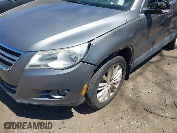 2011 Volkswagen Tiguan SE with VIN WVGBV7AX8BW514320, listed as a IAAI auction lot 42138794 with 76,079 mi miles and . Bid and sale history available at DreamBid. Image 6.