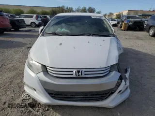 2010 Honda Insight EX z VIN JHMZE2H75AS007066, wystawiony jako Copart lot #54910995 z przebiegiem 107 658 mil mil oraz Szkoda całkowita • Salvage title. Historia ofert i sprzedaży dostępna na DreamBid. Obrazek 5.