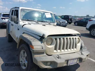 2020 Jeep Wrangler Unlimited Sport S с VIN 1C4HJXDG6LW110066, выставлен на аукционе IAAI как лот 42645129 с пробегом 76 778 миль миль и . История ставок и продаж доступна на DreamBid. Изображение 1.