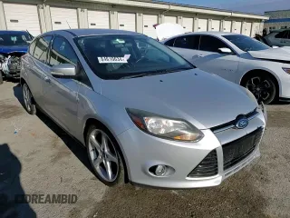 2014 Ford Focus Titanium z VIN 1FADP3N2XEL263357, wystawiony jako Copart lot #84610634 z przebiegiem 142 023 mil mil oraz Nie do naprawy • Non repairable. Historia ofert i sprzedaży dostępna na DreamBid. Obrazek 12.