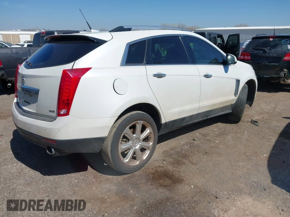 2014 Cadillac SRX Performance Collection with VIN 3GYFNCE36ES527809, listed as a IAAI auction lot 41790776 with 166,302 mi miles. Bid and sale history available at carsss.com. Image 4.