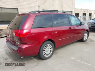 2009 Toyota Sienna XLE with VIN 5TDZK22C29S261516, listed as a IAAI auction lot 41831006 with 147,667 mi miles. Bid and sale history available at carsss.com. Image 4.