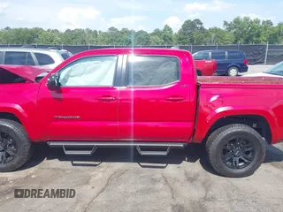 2020 Toyota Tacoma SR5 with VIN 3TMAZ5CN0LM125435, listed as a IAAI auction lot 42274793 with 91,460 mi miles and . Bid and sale history available at DreamBid. Image 14.