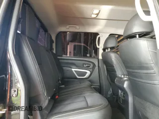2018 Nissan Titan Pro-4X z VIN 1N6AA1E51JN531463, wystawiony jako Copart lot #52995885 z przebiegiem 62 873 mil mil oraz Szkoda całkowita • Salvage title. Historia ofert i sprzedaży dostępna na DreamBid. Obrazek 10.