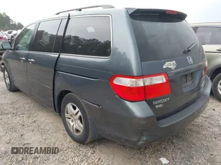 2006 Honda Odyssey EX-L z VIN 5FNRL38756B420817, wystawiony jako IAAI lot #42101271 z przebiegiem 203 892 mil mil oraz . Historia ofert i sprzedaży dostępna na DreamBid. Obrazek 3.