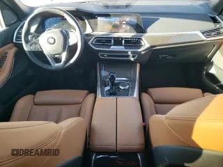 2023 BMW X5 xDrive40i with VIN 5UXCR6C0XP9P15664, listed as a Copart auction lot 47996015 with 22,849 mi miles and Salvage title. Bid and sale history available at DreamBid. Image 8.