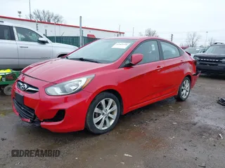 2012 Hyundai Accent GLS with VIN KMHCU4AEXCU168661, listed as a IAAI auction lot 41963258 with 216,006 mi miles. Bid and sale history available at carsss.com. Image 17.