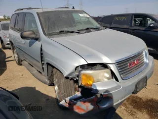 2007 GMC Envoy SLT with VIN 1GKDS13S572158514, listed as a Copart auction lot 74208144 with 209,797 mi miles and Salvage Title. Bid and sale history available at carsss.com. Image 4.