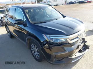 2019 Honda Pilot EX-L with VIN 5FNYF6H5XKB088337, listed as a IAAI auction lot 41944639 with 111,396 mi miles. Bid and sale history available at carsss.com. Image 1.