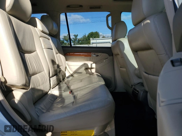 2004 Lexus GX 470 with VIN JTJBT20X440055224, listed as a Copart auction lot 75511534 with 87,324 mi miles and Salvage Title. Bid and sale history available at carsss.com. Image 11.
