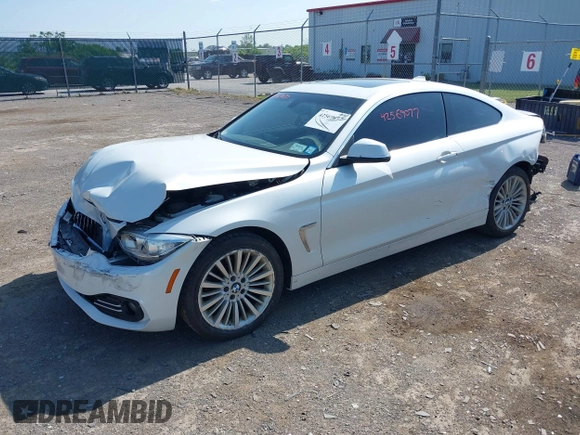 2015 BMW 4 Series 428i xDrive with VIN WBA3N5C52FK484864, listed as a IAAI auction lot 42569077 with 95,431 mi miles and . Bid and sale history available at DreamBid. Image 2.