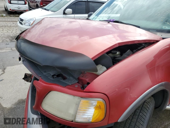 1999 Ford Expedition XLT z VIN 1FMRU1869XLC10336, wystawiony jako Copart lot #55728985 z przebiegiem Nie podano mil oraz Szkoda całkowita • Salvage title. Historia ofert i sprzedaży dostępna na DreamBid. Obrazek 12.
