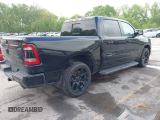 2023 Ram 1500 Laramie with VIN 1C6SRFJTXPN541328, listed as a IAAI auction lot 42121615 with 61,939 mi miles and . Bid and sale history available at DreamBid. Image 4.