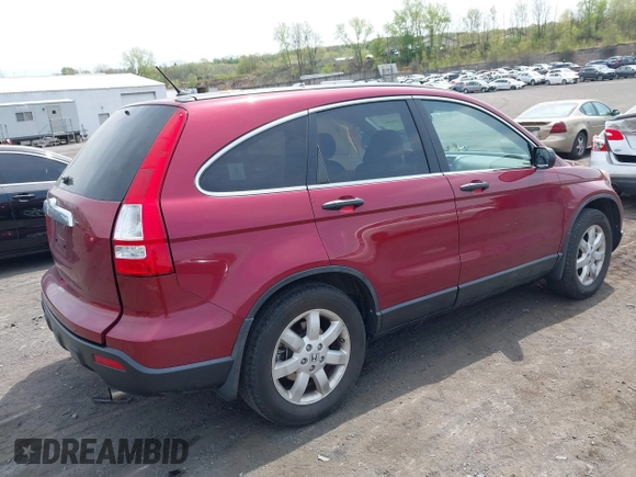 2009 Honda CR-V EX with VIN 5J6RE48529L070296, listed as a IAAI auction lot 42154983 with 61,679 mi miles and . Bid and sale history available at carsss.com. Image 4.