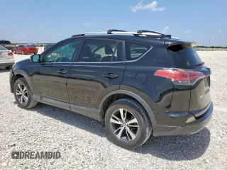 2018 Toyota RAV4 XLE with VIN 2T3WFREV7JW429716, listed as a Copart auction lot 64309045 with 156,445 mi miles and Salvage title. Bid and sale history available at DreamBid. Image 2.