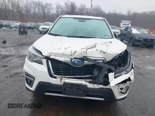2019 Subaru Forester Touring with VIN JF2SKAWC3KH555900, listed as a IAAI auction lot 41558281 with 138,351 mi miles. Bid and sale history available at carsss.com. Image 12.