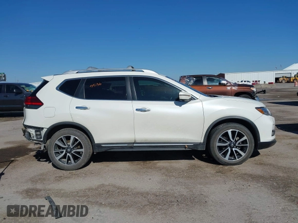 2017 Nissan Rogue S with VIN JN8AT2MV0HW250980, listed as a IAAI auction lot 41744467 with 177,319 mi miles and . Bid and sale history available at DreamBid. Image 13.
