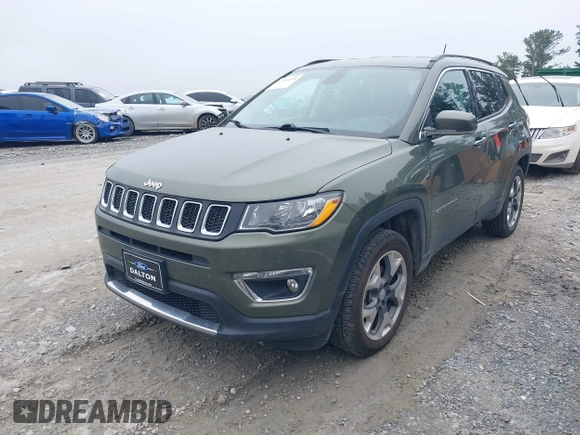2020 Jeep Compass Limited with VIN 3C4NJDCB2LT127296, listed as a IAAI auction lot 42555235 with 105,259 mi miles and . Bid and sale history available at DreamBid. Image 2.