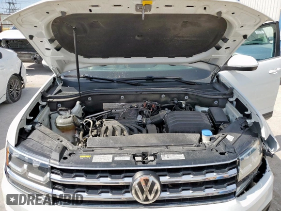 2019 Volkswagen Atlas SE z VIN 1V2WR2CA0KC596775, wystawiony jako Copart lot #56902495 z przebiegiem 57 040 mil mil oraz Szkoda całkowita • Salvage title. Historia ofert i sprzedaży dostępna na DreamBid. Obrazek 12.