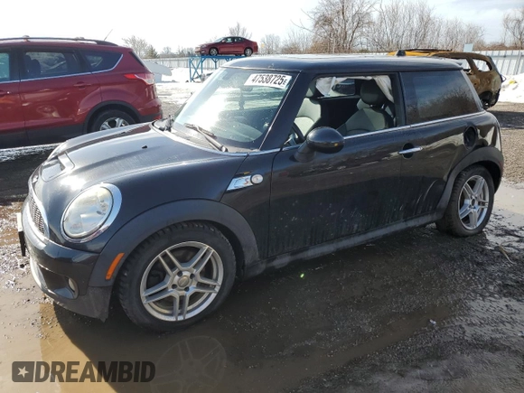 2009 MINI Hardtop S with VIN WMWMF73559TW85198, listed as a Copart auction lot 47538725 with 136,006 mi miles and Salvage title. Bid and sale history available at DreamBid. Image 1.