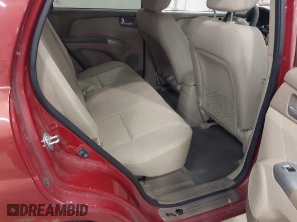 2009 Kia Sportage LX with VIN KNDJE723497555026, listed as a IAAI auction lot 42102679 with 136,398 mi miles. Bid and sale history available at carsss.com. Image 8.