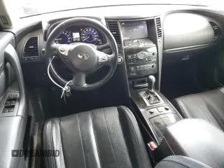 2017 Infiniti QX70 z VIN JN8CS1MW7HM412159, wystawiony jako Copart lot #55269885 z przebiegiem 154 675 mil mil oraz Szkoda całkowita • Salvage title. Historia ofert i sprzedaży dostępna na DreamBid. Obrazek 8.