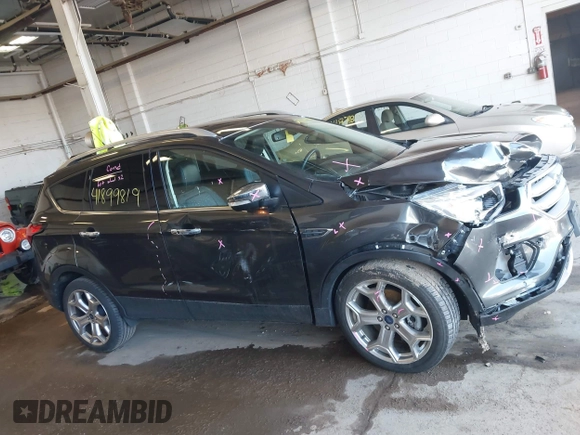 2019 Ford Escape Titanium with VIN 1FMCU9J95KUA19816, listed as a IAAI auction lot 41899819 with 71,760 mi miles and . Bid and sale history available at DreamBid. Image 13.