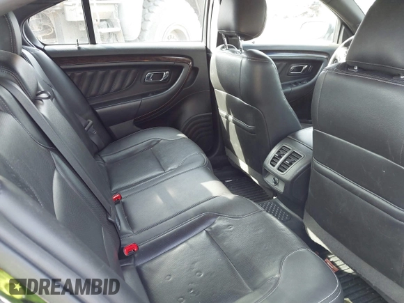 2013 Ford Taurus Limited with VIN 1FAHP2J88DG100817, listed as a IAAI auction lot 42170346 with 156,396 mi miles and . Bid and sale history available at DreamBid. Image 8.