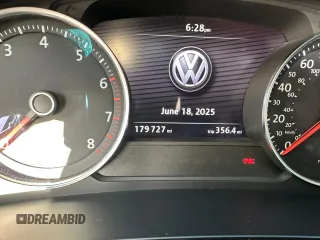 2014 Volkswagen Touareg Sport with VIN WVGEF9BP7ED003332, listed as a Copart auction lot 63043535 with 179,727 mi miles and Salvage title. Bid and sale history available at DreamBid. Image 8.