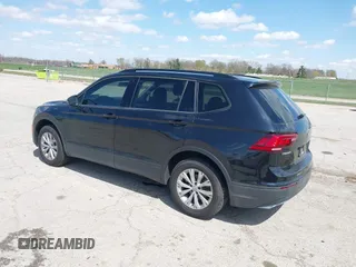 2019 Volkswagen Tiguan S with VIN 3VV0B7AX3KM119645, listed as a IAAI auction lot 41973924 with 100,914 mi miles and . Bid and sale history available at DreamBid. Image 3.