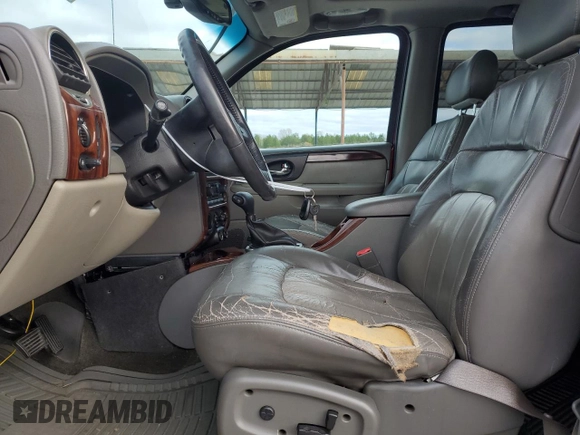 2003 GMC Envoy SLE z VIN 1GKDS13S632143174, wystawiony jako Copart lot #81514914 z przebiegiem Nie podano mil oraz Szkoda całkowita • Salvage title. Historia ofert i sprzedaży dostępna na DreamBid. Obrazek 7.