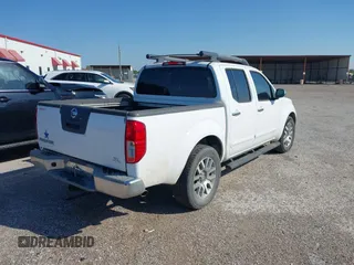 2012 Nissan Frontier SL with VIN 1N6AD0ER3CC451455, listed as a IAAI auction lot 41944964 with 143,054 mi miles and . Bid and sale history available at DreamBid. Image 4.