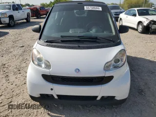 2009 Smart fortwo Passion z VIN WMEEK31X29K274073, wystawiony jako Copart lot #66758044 z przebiegiem 128 564 mil mil oraz Szkoda całkowita • Salvage title. Historia ofert i sprzedaży dostępna na DreamBid. Obrazek 5.