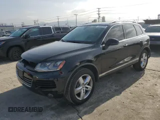 2012 Volkswagen Touareg Sport with VIN WVGEF9BP8CD008746, listed as a Copart auction lot 45638945 with 138,945 mi miles and Salvage Title. Bid and sale history available at DreamBid. Image 1.