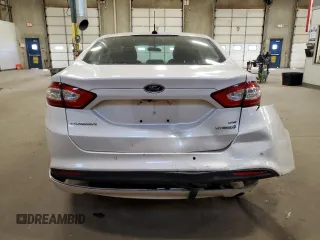 2016 Ford Fusion SE Hybrid with VIN 3FA6P0LU5GR304168, listed as a Copart auction lot 52404165 with 90,344 mi miles and Salvage Title. Bid and sale history available at carsss.com. Image 6.