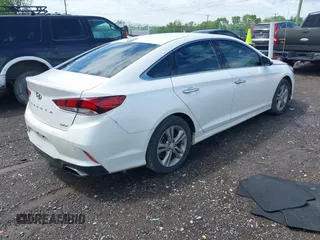 2018 Hyundai Sonata SEL with VIN 5NPE34AF9JH670688, listed as a IAAI auction lot 42115485 with 148,519 mi miles and . Bid and sale history available at carsss.com. Image 4.