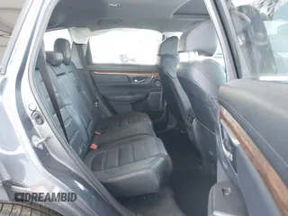 2020 Honda CR-V Touring z VIN 7FART6H91LE000684, wystawiony jako IAAI lot #42504731 z przebiegiem 49 100 mil mil oraz . Historia ofert i sprzedaży dostępna na DreamBid. Obrazek 8.