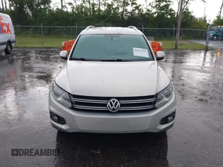 2013 Volkswagen Tiguan SE z VIN WVGAV7AX2DW532486, wystawiony jako IAAI lot #42813235 z przebiegiem 164 321 mil mil oraz . Historia ofert i sprzedaży dostępna na DreamBid. Obrazek 12.