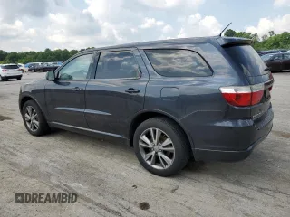 2013 Dodge Durango SXT with VIN 1C4RDJAG2DC679979, listed as a Copart auction lot 64377695 with 209,671 mi miles and Clean title. Bid and sale history available at DreamBid. Image 2.