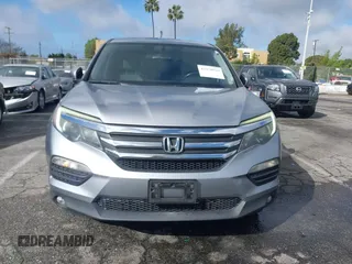 2016 Honda Pilot EX-L with VIN 5FNYF5H57GB038349, listed as a IAAI auction lot 41378569 with 117,651 mi miles and . Bid and sale history available at DreamBid. Image 12.