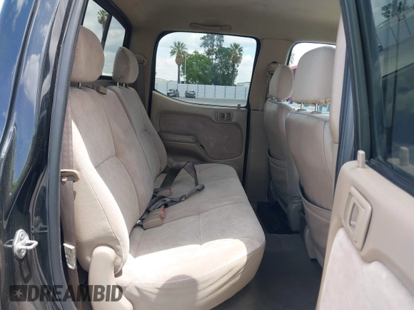 2003 Toyota Tacoma PreRunner z VIN 5TEGN92N03Z210194, wystawiony jako IAAI lot #42243037 z przebiegiem 241 047 mil mil oraz . Historia ofert i sprzedaży dostępna na DreamBid. Obrazek 8.