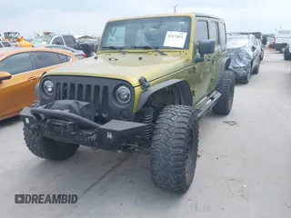 2008 Jeep Wrangler Unlimited Sahara with VIN 1J8GA59108L574959, listed as a IAAI auction lot 42171011 with Not Provided miles and . Bid and sale history available at carsss.com. Image 2.