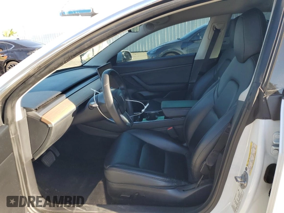 2020 Tesla Model 3 Standard Range Plus with VIN 5YJ3E1EA5LF660417, listed as a Copart auction lot 48144125 with 112,924 mi miles and Salvage Title. Bid and sale history available at DreamBid. Image 7.