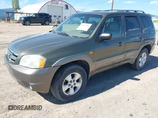 2002 Mazda Tribute LX with VIN 4F2CU08152KM02067, listed as a IAAI auction lot 42198970 with 212,613 mi miles and . Bid and sale history available at carsss.com. Image 2.