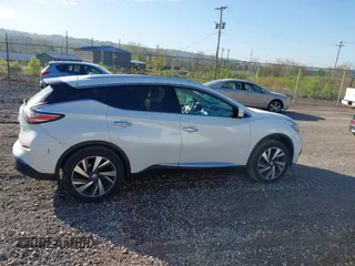 2015 Nissan Murano SL with VIN 5N1AZ2MH2FN252782, listed as a IAAI auction lot 42122573 with 129,918 mi miles and . Bid and sale history available at DreamBid. Image 13.