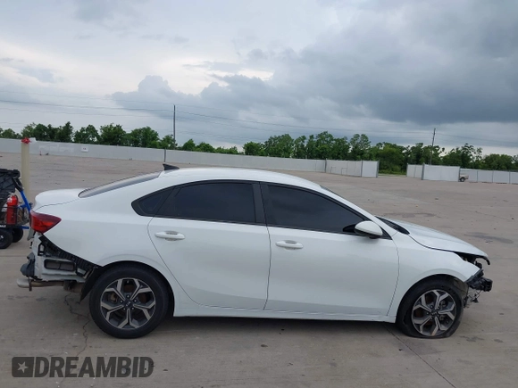 2021 Kia Forte LXS with VIN 3KPF24AD0ME361786, listed as a IAAI auction lot 42427196 with 60,013 mi miles and . Bid and sale history available at DreamBid. Image 12.