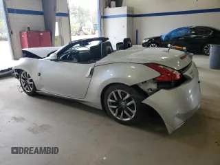 2014 Nissan 370Z Touring with VIN JN1AZ4FH0EM621207, listed as a Copart auction lot 50928485 with Not Provided miles and Salvage Title. Bid and sale history available at DreamBid. Image 2.
