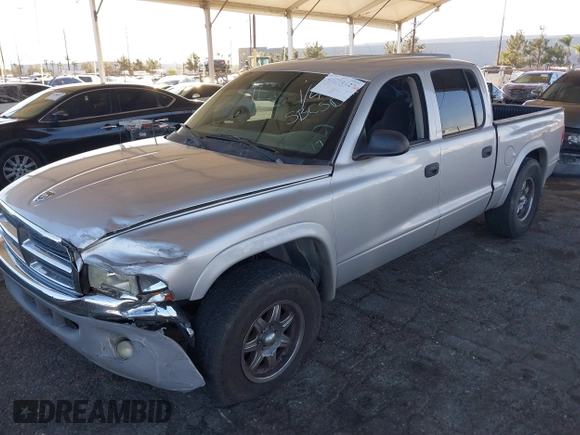 2003 Dodge Dakota SLT with VIN 1D7HL48N13S294573, listed as a IAAI auction lot 41291127 with 227,355 mi miles. Bid and sale history available at carsss.com. Image 17.