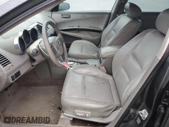2004 Nissan Maxima SE with VIN 1N4BA41E14C901248, listed as a Copart auction lot 52100375 with 124,473 mi miles and Salvage Title. Bid and sale history available at DreamBid. Image 7.